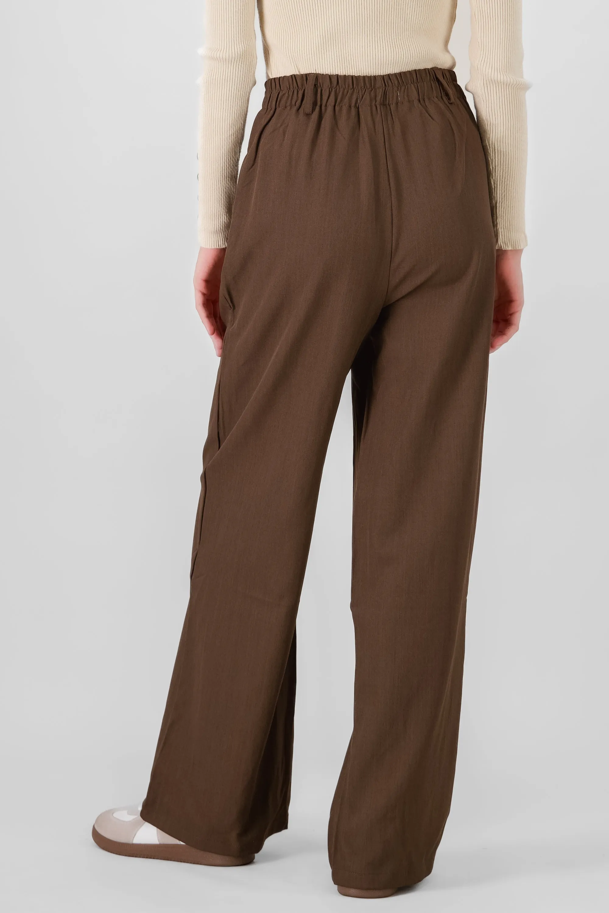 Pantalon amplio detalle doble boton