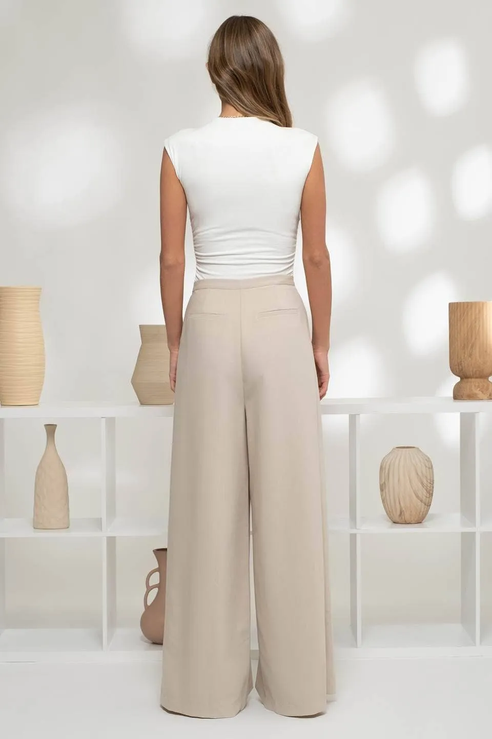 REVERSIBLE MOCK NECK SLEEVELESS KNIT BODYSUIT