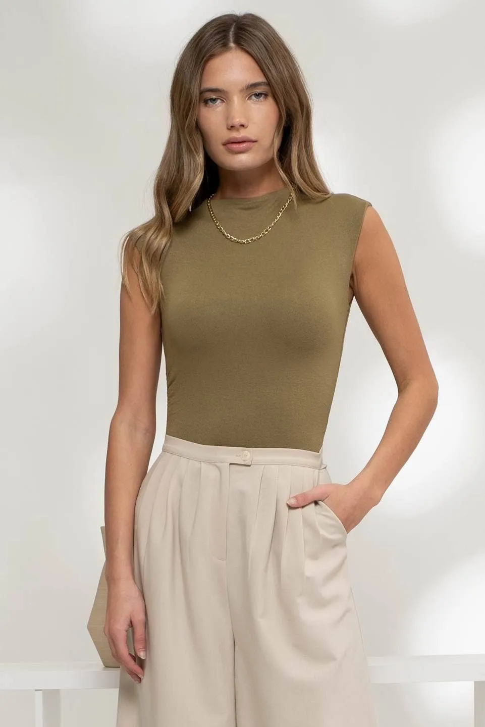 REVERSIBLE MOCK NECK SLEEVELESS KNIT BODYSUIT
