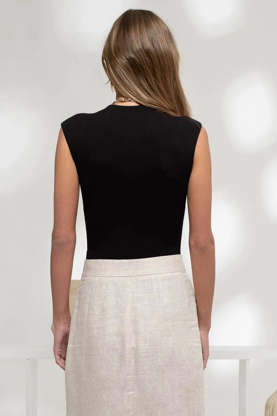 REVERSIBLE MOCK NECK SLEEVELESS KNIT BODYSUIT