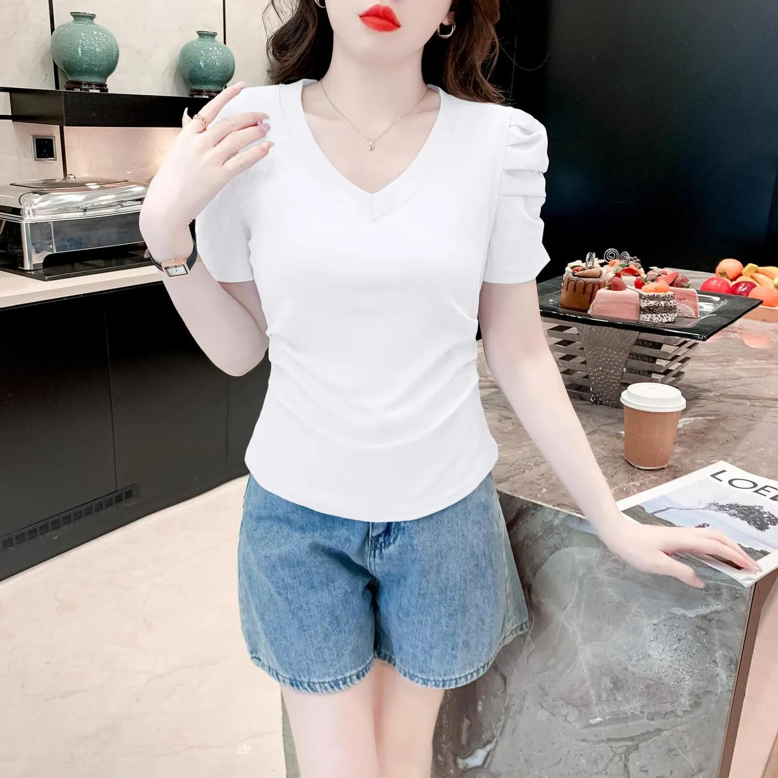 Solid Cotton T-Shirt Featuring Rounded Hem and Puff Sleeves